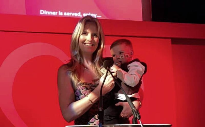 West Belfast three-year-old D&aacute;ith&iacute; Mac Gabhann pictured with Penny Lancaster at the British Heart Foundation&rsquo;s Heart Hero Awards in London 
