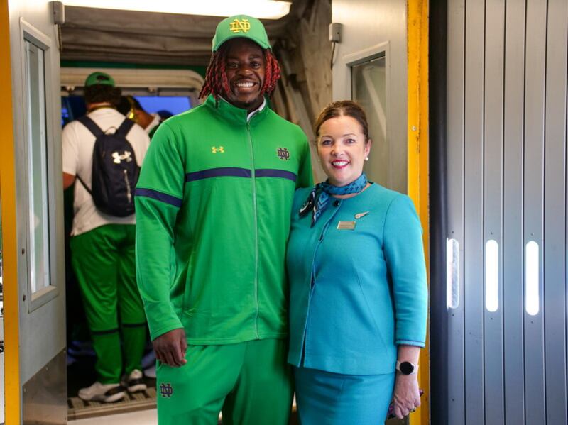 Notre Dame defensive lineman Nana Osafo-Mensah with Aer Lingus cabin service manager Rosemary O‘Doherty