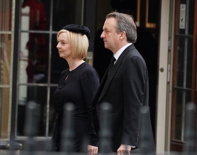 Prime Minister Liz Truss and husband Hugh O'Leary arrive at the State Funeral of Queen Elizabeth II,