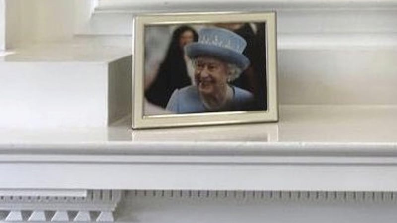 Secretary of State Julian Smith has a photo of the queen in his private office at Stormont House. Picture from Twitter/ Julian Smith 