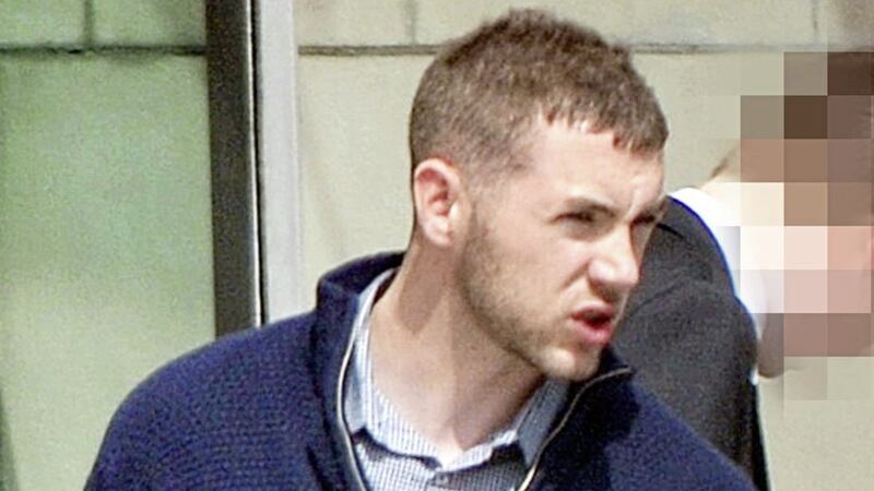 Eamon Coyle (24) leaves Belfast Crown Court after being cleared of involvement in a violent robbery in Co Tyrone 