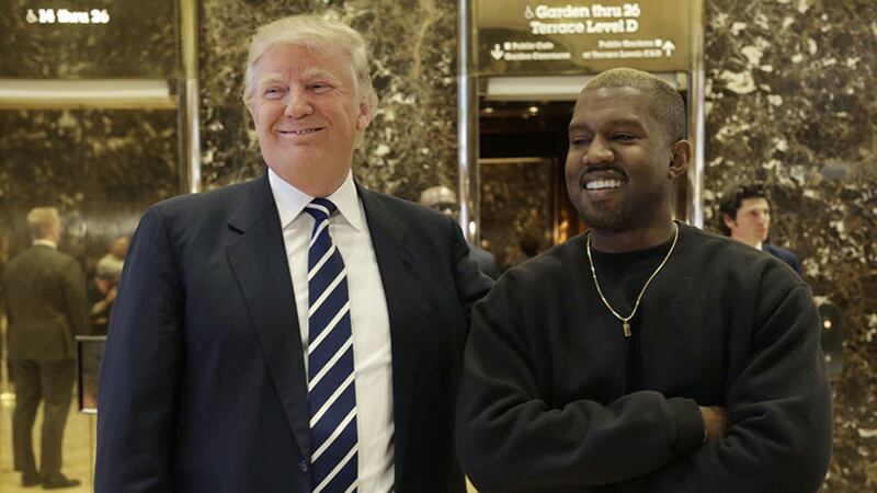 President-elect Donald Trump and Kanye West pose for a picture in the lobby of Trump Tower in New York, Tuesday, December 13, 2016&nbsp;