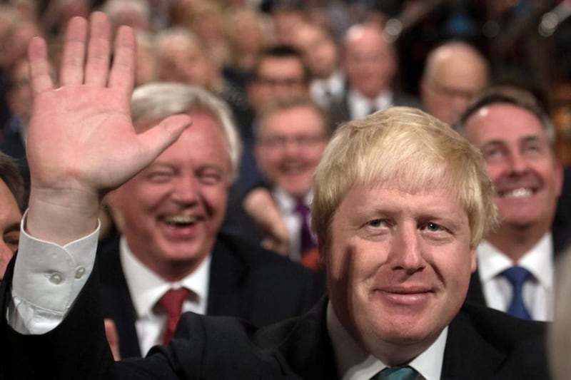Foreign Secretary Boris Johnson waves before Prime Minister Theresa May gave her keynote speech on the fourth day of the Conservative party conference at the ICC in Birmingham yesterday PICTURE: Stefan Rousseau/PA 