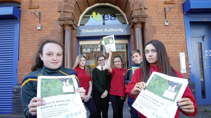Pupils and teachers from Col&aacute;iste Feirste, Holy Trinity Cookstown and Girls Model present the findings to the Education Authority. Picture by Mal McCann 