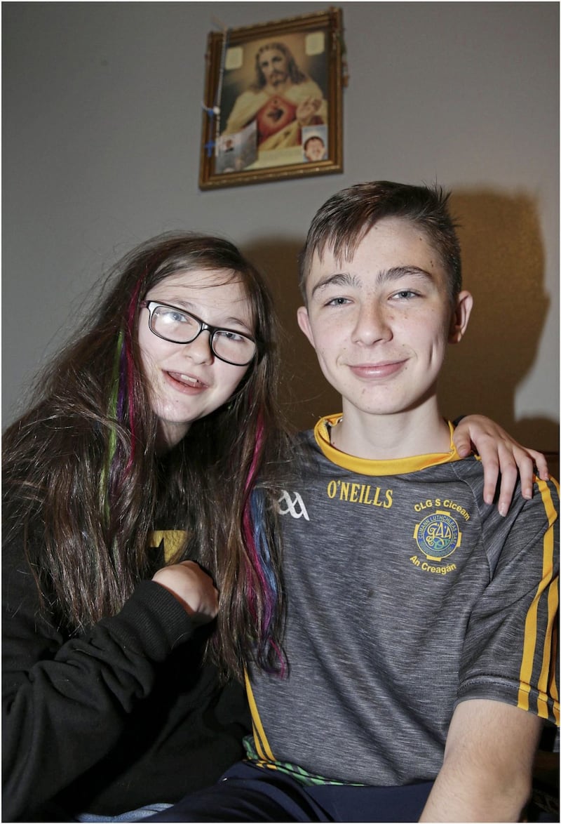 Mary O&#39;Neill pictured with her brother, Fintan, one year after the pair suffered a catalogue of injuries when they were knocked down by a car getting off a school bus in Co Antrim. Photo by Hugh Russell 