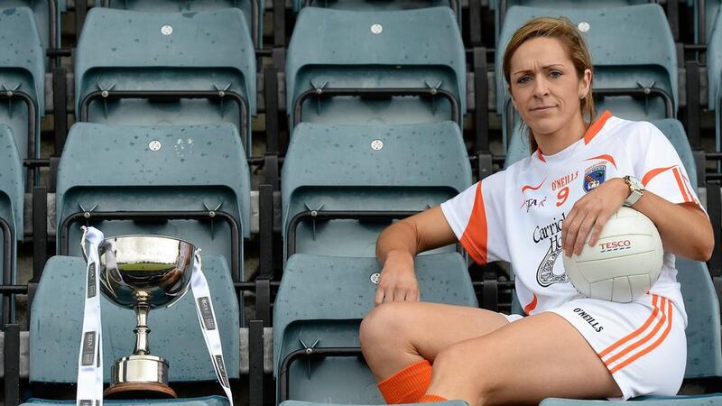 Armagh&#39;s Caroline O&#39;Hanlon gets acquainted with the Ladies&#39; NFL Division Two trophy ahead of Saturday&#39;s final 