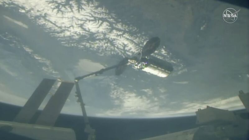Astronaut Anne McClain used a robot arm to capture the capsule 258 miles above France.