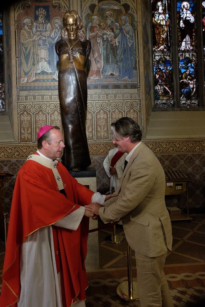 Archbishop Eamon Martin with sculptor Dony MacManus, who crafted the statue of St Oliver Plunkett. Picture by LiamMcArdle.com