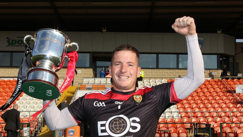Down skipper Stephen Keith with the NHL Division 2B trophy after their final win over Derry. Picture by Louis McNally&nbsp;