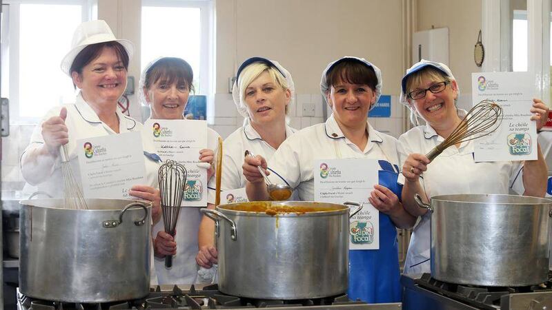 Mercy College canteen staff proudly show off their Cupla Focal certificates. Picture by Mal McCann 