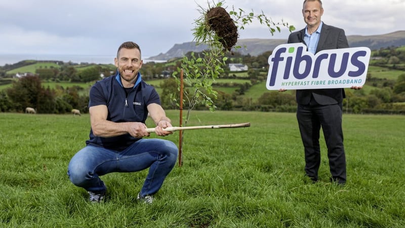 Antrim hurler Neil McManus, pictured alongside Fibrus Chief Operating Officer Shane Haslem, has teamed up with the full fibre broadband provider to support the &lsquo;Plant the Planet&rsquo; GAA games in Kenya. 