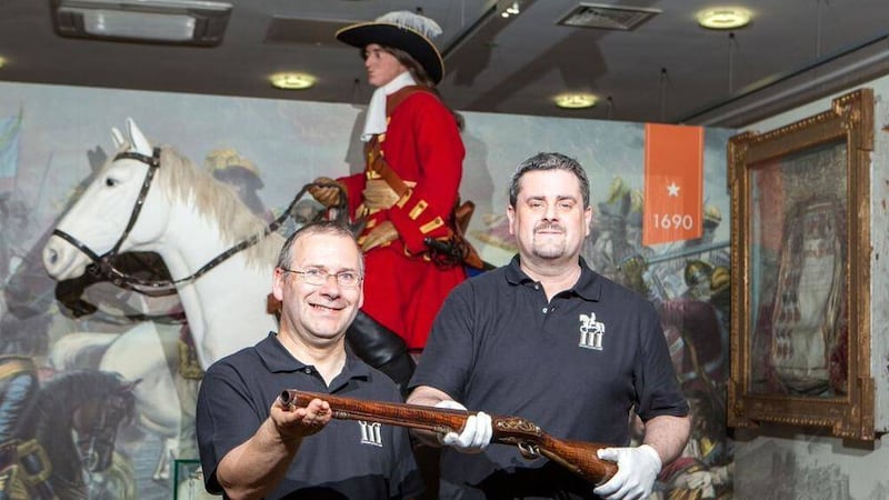 Grand Lodge director of services, David Hume (left), and curator, Jonathan Mattison, show off the much sought-after Boyne musket which has just gone on public display at the Museum of Orange Heritage, Belfast 
