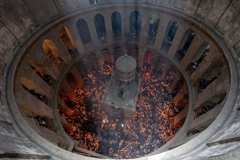 The event takes place at the Church of the Holy Sepulchre (AP)