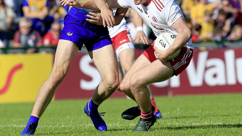 Tyrone&#39;s Peter Harte and Roscommon&#39;s Brian Stack in action during the GAA Football All-Ireland Senior Championship quarter-final Group 2 Phase 1 between Tyrone and Roscommon at Dr Hyde Park in Roscommon on Sunday July 13 2019. Picture by Philip Walsh 