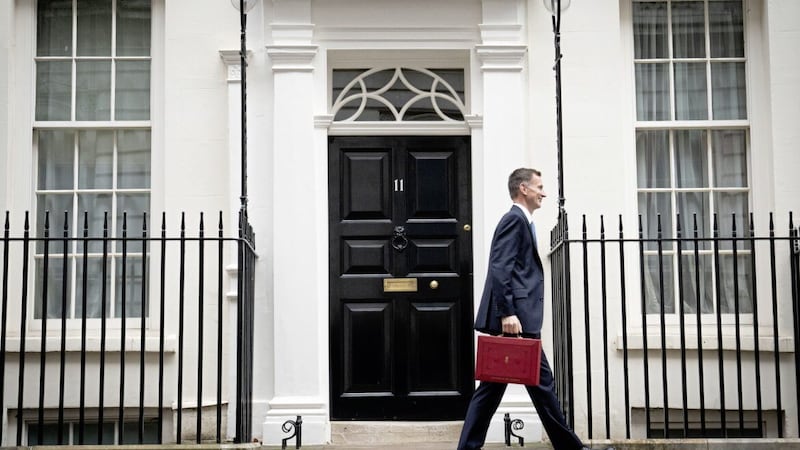 Chancellor Jeremy Hunt leaves 11 Downing Street with his ministerial box on Wednesday. Picture by Stefan Rousseau 