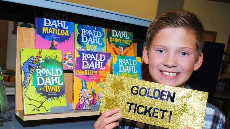 Thomas Malcomson, aged 11 from Dromore in Co Down, helps launch the Roald Dahl 100 Celebrations in Libraries NI. 