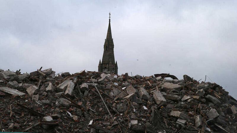 The spire of St Patrick&#39;s Church above the rubble of Belfast&#39;s Orpheus building. Picture by Hugh Russell 