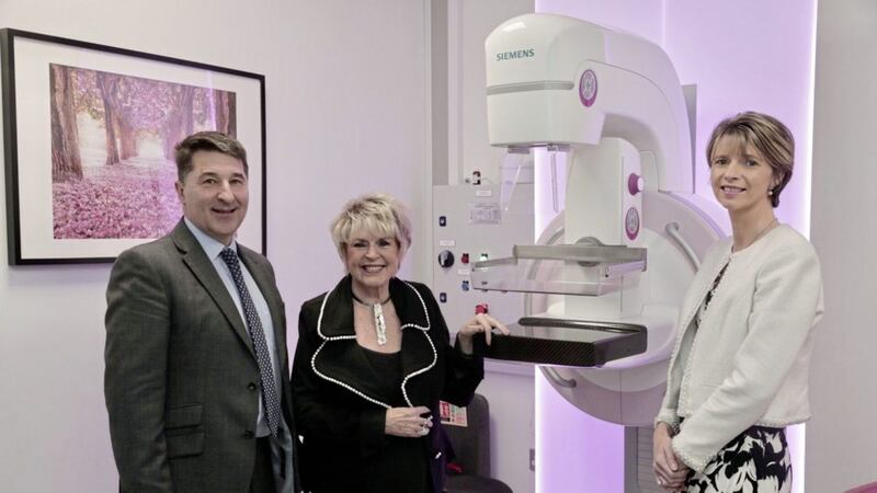 Gareth Kirk, Action Cancer Chief Executive, Gloria Hunniford, charity patron and Ashley Hurst, charity ambassador pictured in front of the 3D breast screening machine following the opening of the new &pound;2.4m centre  