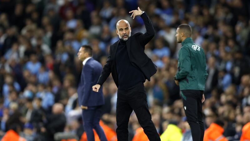 Pep Guardiola gestures during the win over Red Star Belgrade (Nigel French/PA)