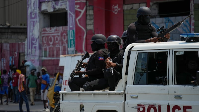 Police patrol the Champ de Mars area of Port-au-Prince, Haiti (Ramon Espinosa/AP)