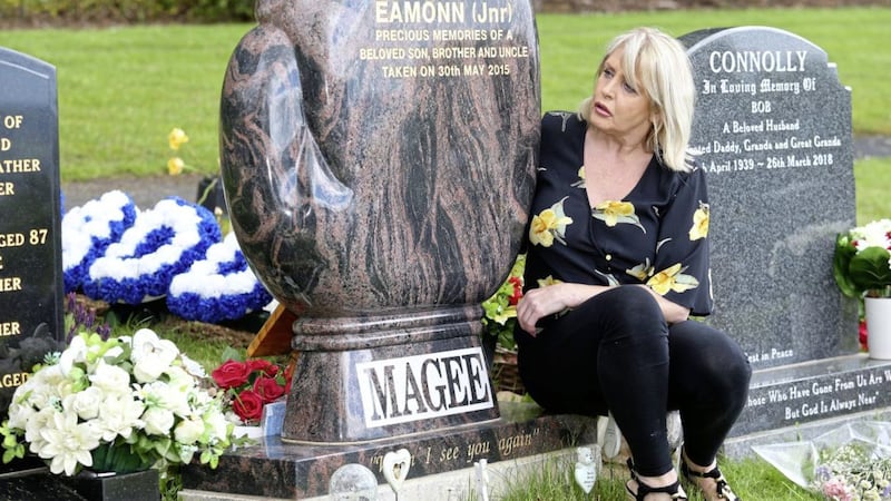 Mary Magee beside her son Eamonn&#39;s headstone. Picture by Mal McCann 