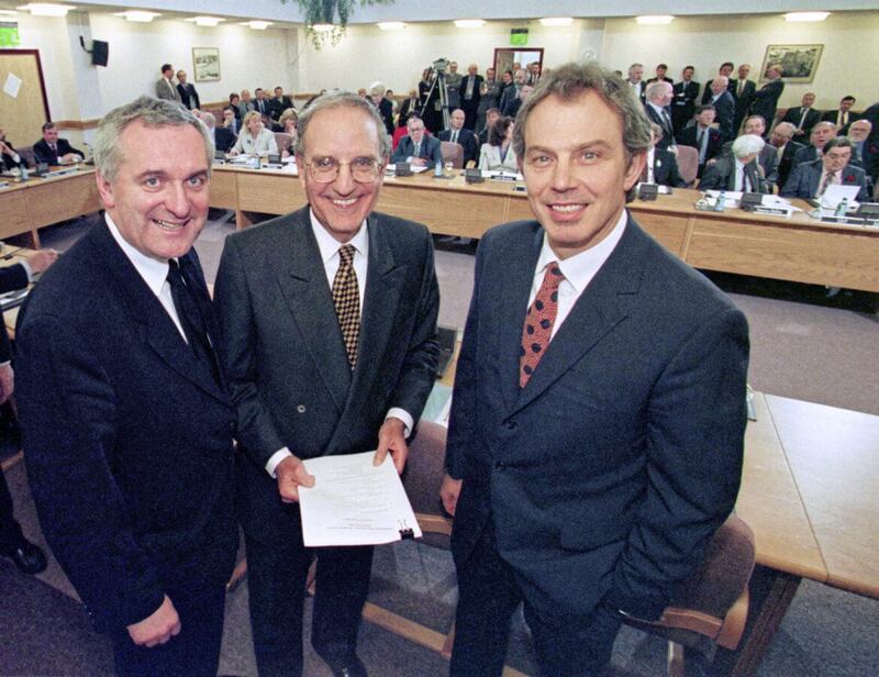 Former Prime Minister Tony Blair (right), US Senator George Mitchell (centre) and Taoiseach Bertie Ahern pictured after signing the Good Friday Agreement in 1998. Picture by Dan Chung/PA Wire 