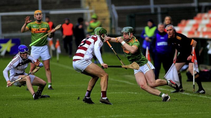 Dunloy manager Gregory O&rsquo;Kane watches Conal Cunning take on Slaughtneil&rsquo;s Karl McKaigue during the Ulster Club SHC final at the Athletic Grounds. Picture: Seamus Loughran 