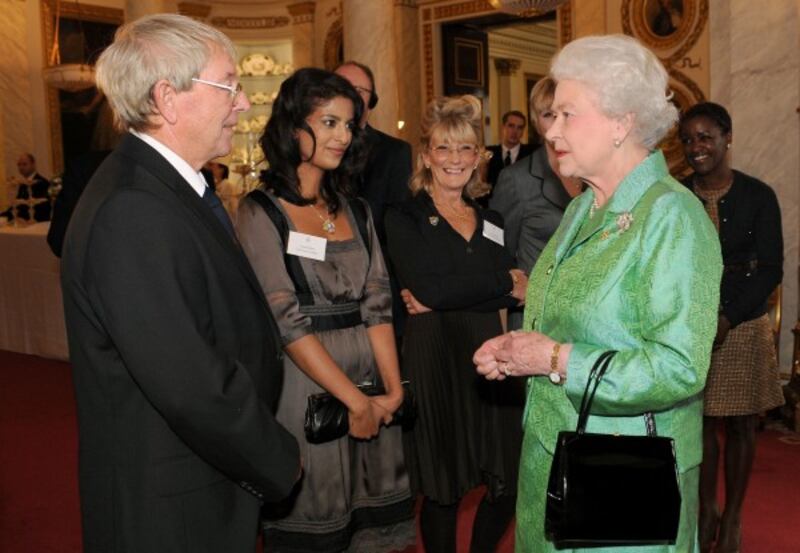 Elizabeth II receiving Blue Peter presenters, (left to right) John Noakes, Konnie Huq, Lesley Judd, and Diane-Louise Jordan, during a reception to mark the programme's 50th birthday (Fiona Hanson/PA)