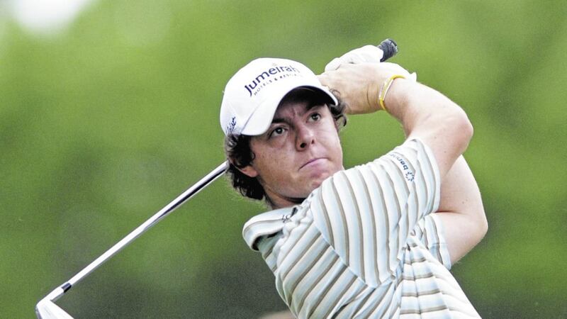 On his way to victory, Rory McIlroy watches his tee shot on the second hole during the final round of the Quail Hollow Championship golf tournament at Quail Hollow Club in Charlotte N.C. Sunday May 2 2010. (AP Photo/Mike McCarn) 