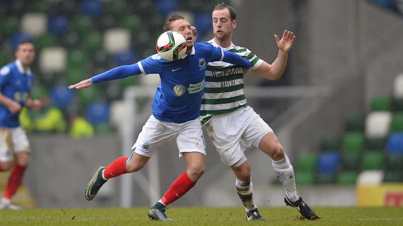 Linfield&rsquo;s Kirk Millar and Lurgan Celtic&rsquo;s Declan McVeigh battle for the ball during Saturday's Irish Cup semi-final at Windsor Park<br/>Picture by Pacemaker&nbsp;