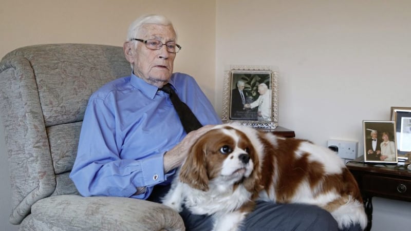 Former SDLP deputy leader Seamus Mallon at his home in Markethill, Co Armagh, this week with his dog Jessie. Picture by Hugh Russell