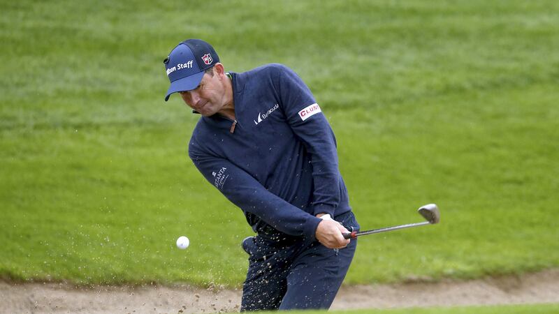Padraig Harrington plays out of a bunker to the 14th green during day one of the Irish Open at the K Club in county Kildare on Thursday<br />Picture by PA&nbsp;