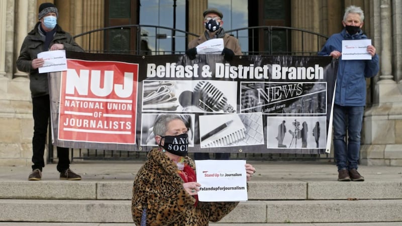 NUJ members Kathryn Johnston, Brian Pelan, Anton McCabe and Robin Wilson at a socially-distanced protest in support of threatened colleagues in Belfast. Picture by Mal McCann 