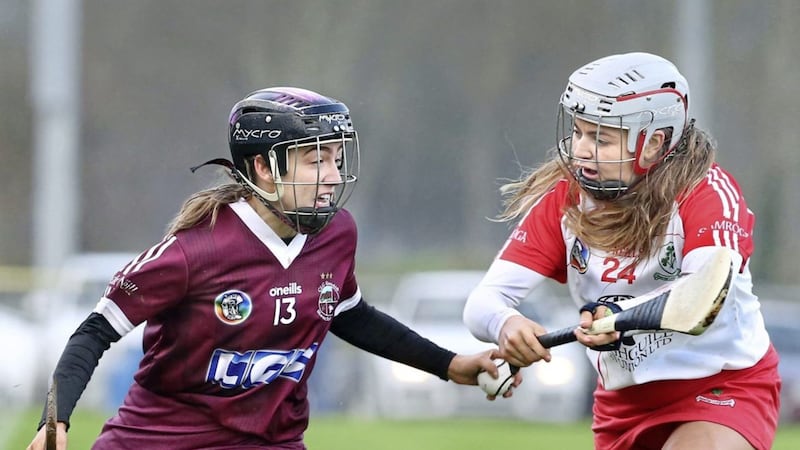 Slaughtneil's Olivia Rafferty with Katie McKillop of Loughgiel during the Ulster Senior Camogie Club Championship Final 2020 replay at Glen Maghera on Saturday, December 4 2021 <br />Picture: Margaret McLaughlin.