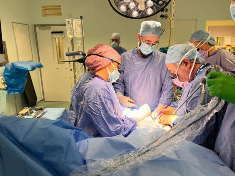 Isabel Quigora and Richard Smith (right) performing a womb transplant on a 34-year-old woman (Womb Transplant UK/PA)