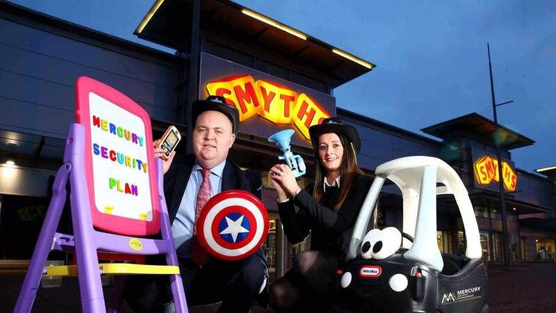 Grainne Elliot and Liam Cullen of Mercury Security celebrate the company's contract with Smyths Toys