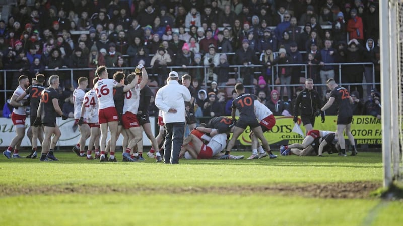 Players from both sides pile into an injury-time scuffle that led to five red cards, four for Tyrone and one for Armagh. Picture by Philip Walsh 