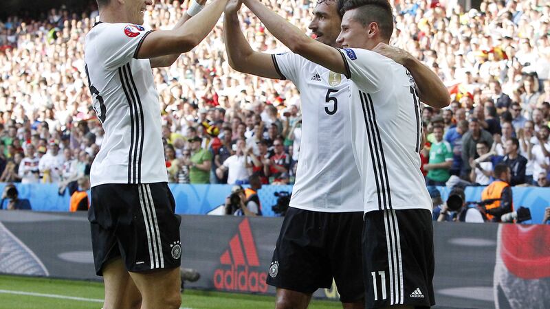 &nbsp;Germany's Julian Draxler, right, celebrates with his teammates Mats Hummels, center, and Mario Gomez after scoring&nbsp;<br />Picture by PA