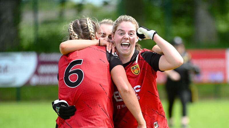 Aisling Cull celebrates with her Down team-mates after her match-winning performance against Fermanagh in the Ulster Junior final      Picture: Brendan Monaghan