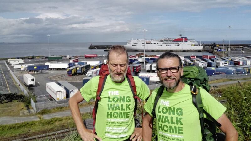 Eamonn Donnelly, right, and his friend Sepp Tieber-Kessler arrive in Rosslare en route to Keady, on their 2,500km Austria-to-Armagh trek in aid of dementia research 