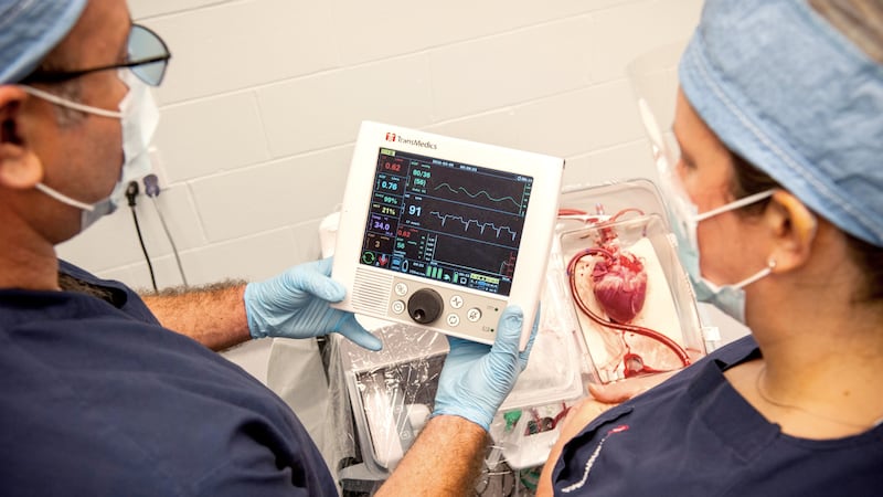 Roger Marr and Julie-Ann Morris had transplants using technology that extends the amount of time a heart is viable for transplant.