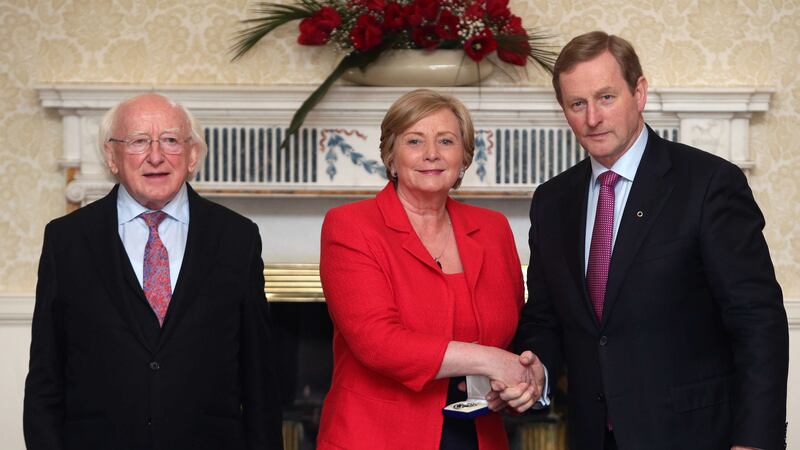 Irish President Michael D Higgins, left, with the new Minister for Justice Frances Fitzgerald and Taoiseach Enda Kenny, at Aras an Uachtarain, Dublin. Picture by Brian Lawless, Press Association<br />&nbsp;
