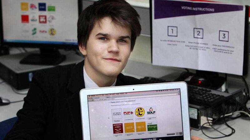 Year 4 Methody student Adam Flanagan shows off his online voting system. Picture by Ann McManus 
