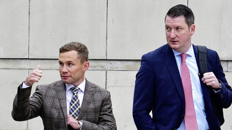 Carl Frampton leaves court accompanied by his solicitor John Finucane 