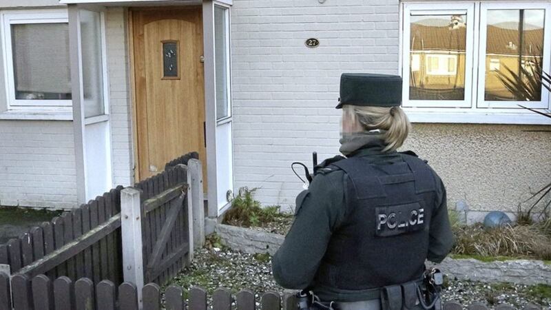Police sealed off the house where the man&#39;s body was found early on New Year&#39;s Day. Picture by Margaret McLaughlin 