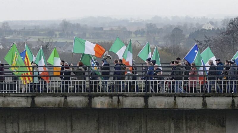 People taking part in an Irish unity march as they cross the Lifford Bridge between Donegal and Strabane. Picture by Niall Carson, Press Association 