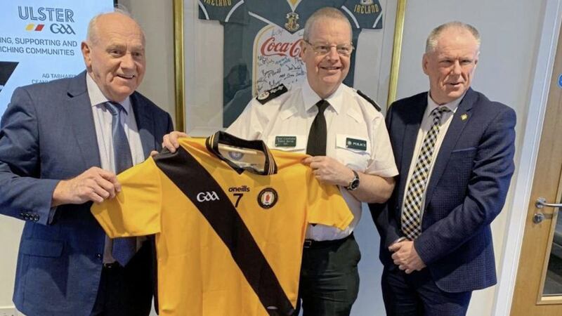 Simon Byrne (centre) pictured with Oliver Galligan (left) and Brian McAvoy of Ulster GAA. Picture from Simon Byrne/ Twitter 