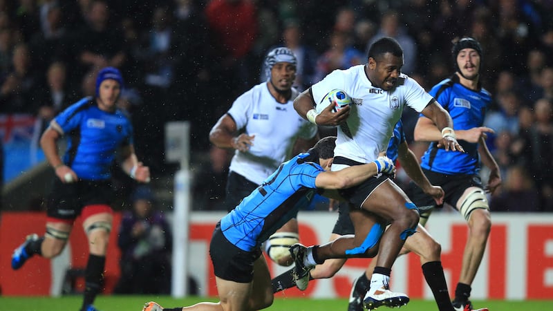 Fiji's Kini Murimurivalu breaks through to score a try against Uruguay during Tuesday night's World Cup match in Milton Keynes&nbsp;