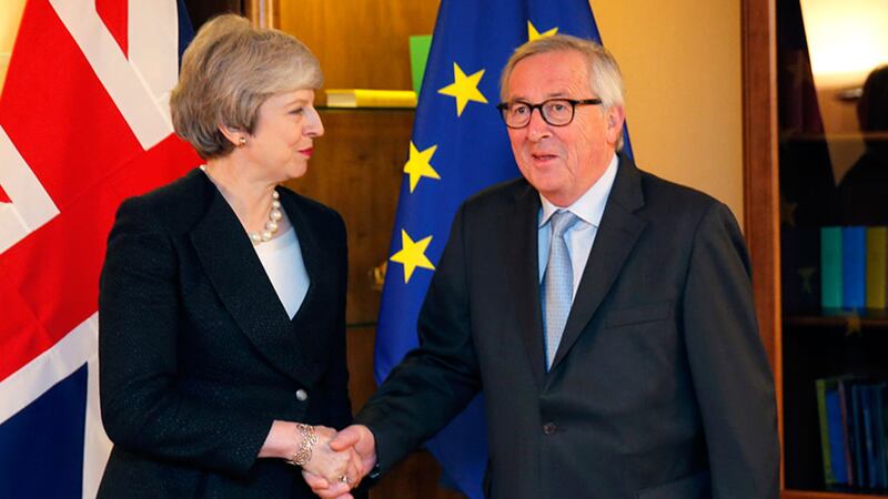 British prime minister Theresa May poses for the media with European Commission President Jean-Claude Juncker in Strasbourg, France, Monday, March 11, 2019&nbsp;