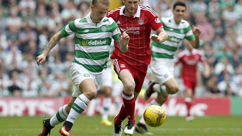 Celtic's Leigh Griffiths in action against Aberdeen's Adam Rooney: Picture by Jane Barlow/PA Wire.
